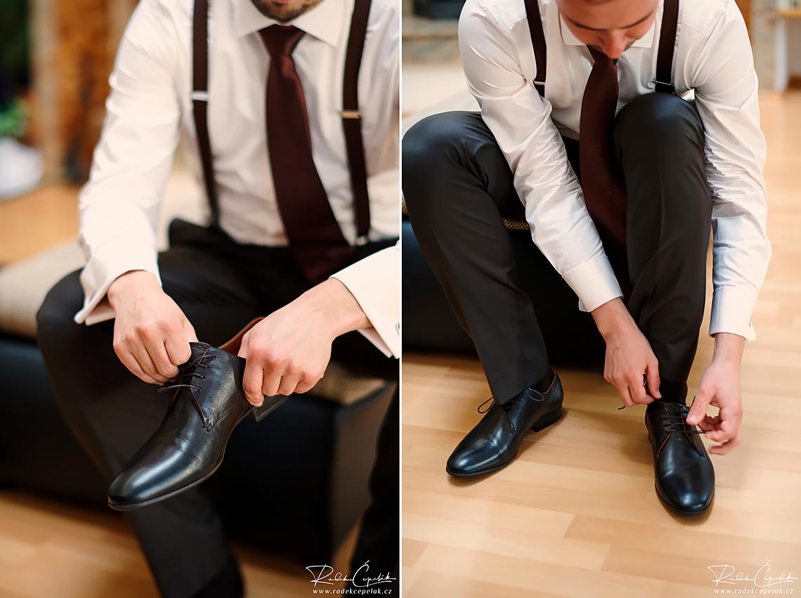 groom puts on shoes at wedding