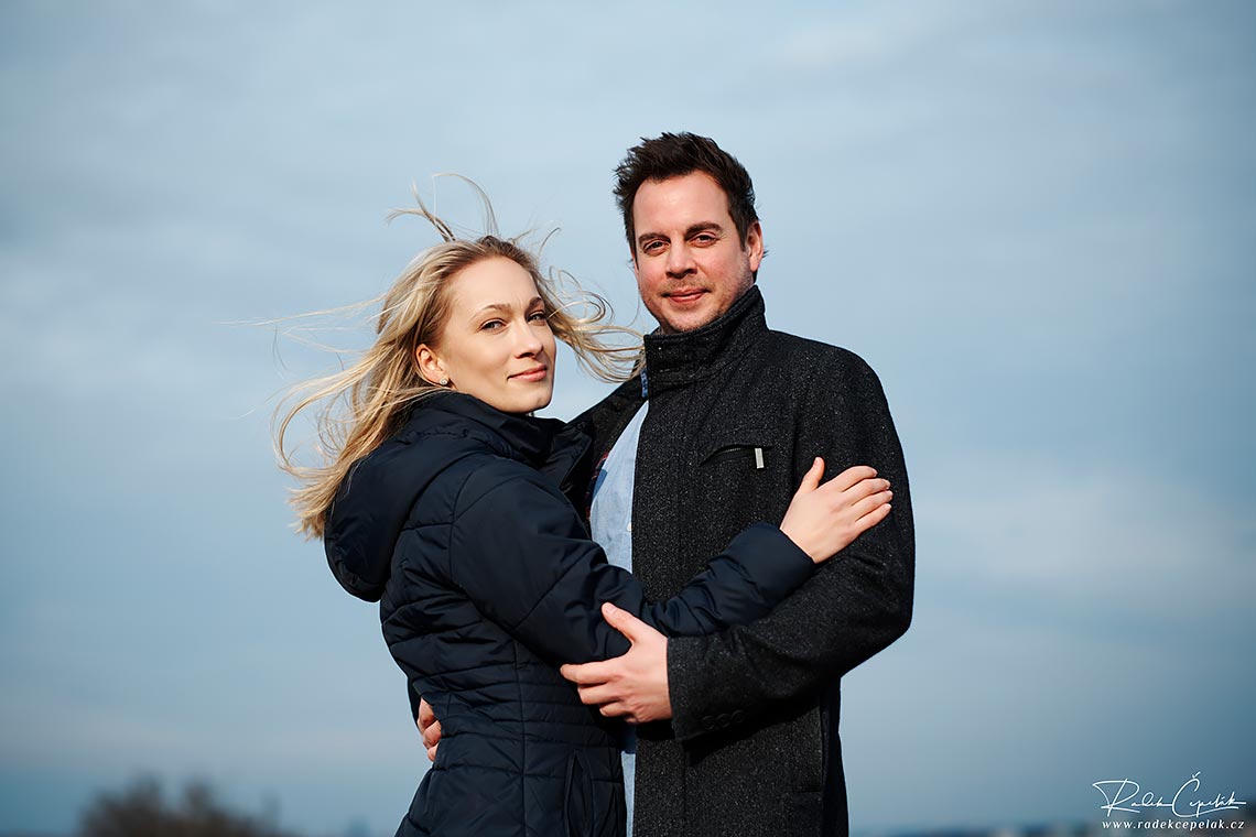 wind in hair during engagement session