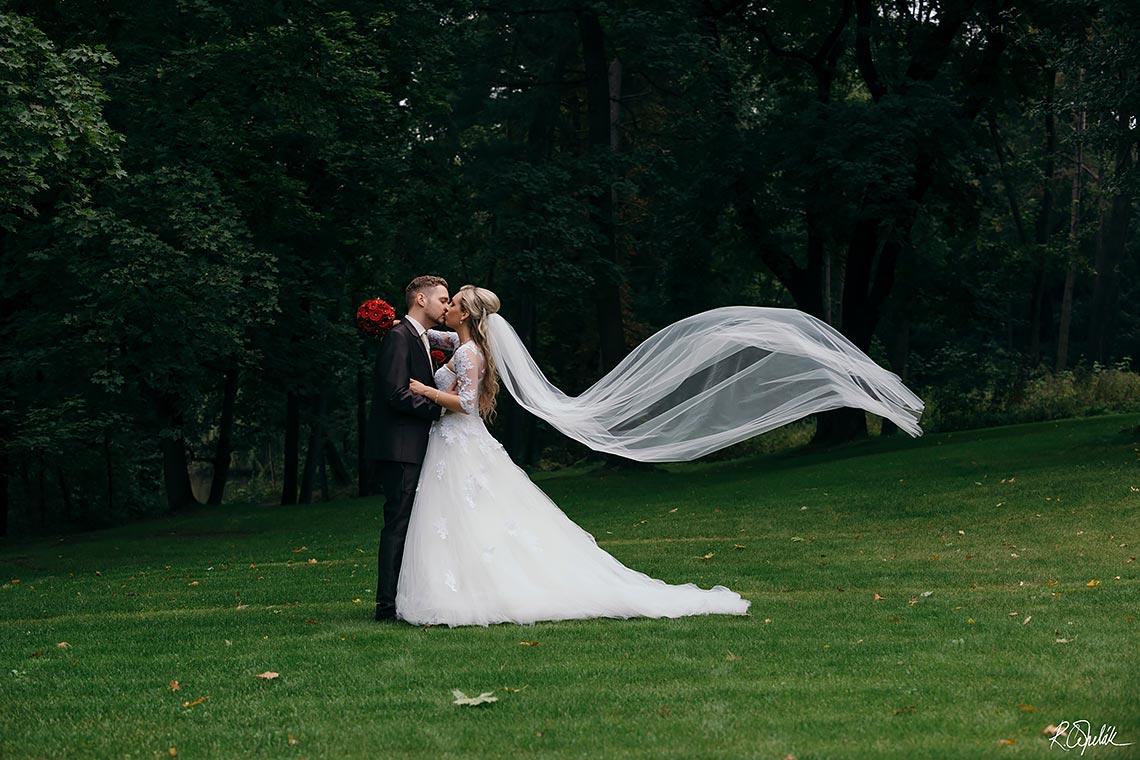 groom and bride with veil, wedding at Chateau st. Havel in Prague