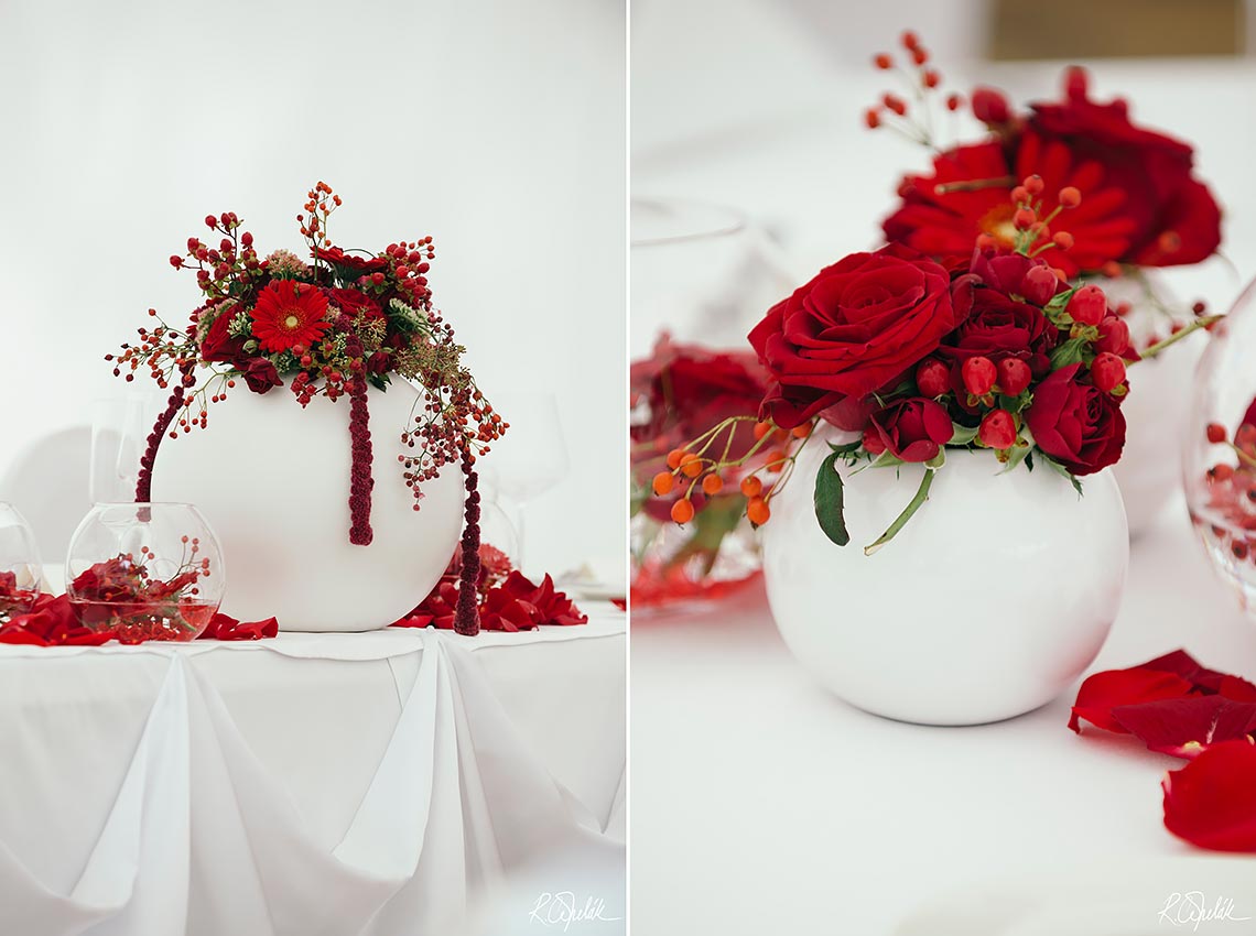 wedding reception with red flowers at Chateau St. Havel in Prague