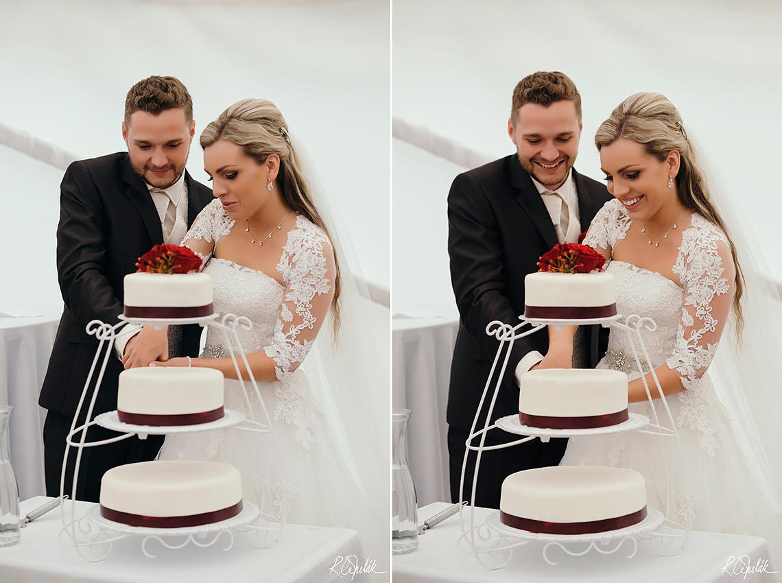 bride and groom cutting three-storey red-white wedding cake