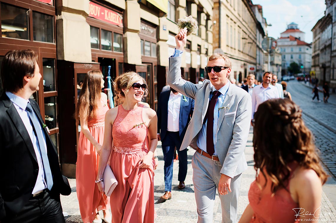 wedding guests walking in Prague