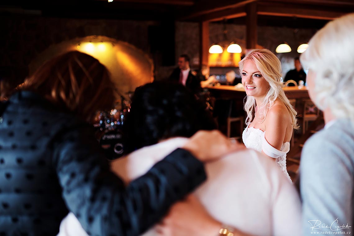dancing bride with wedding guests