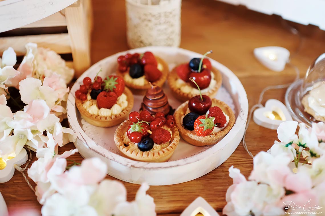 Fruit wedding sweet with strawberry, cherry, rhapsberry and creame