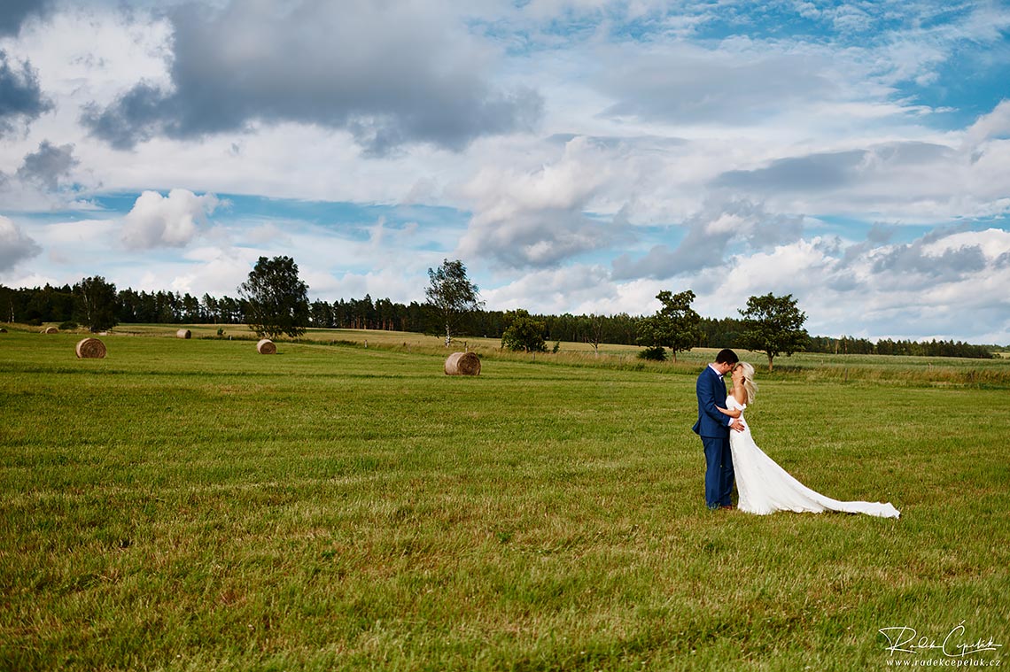 Bride and groom wedding photography in the nature close to Hejtmankovice barn