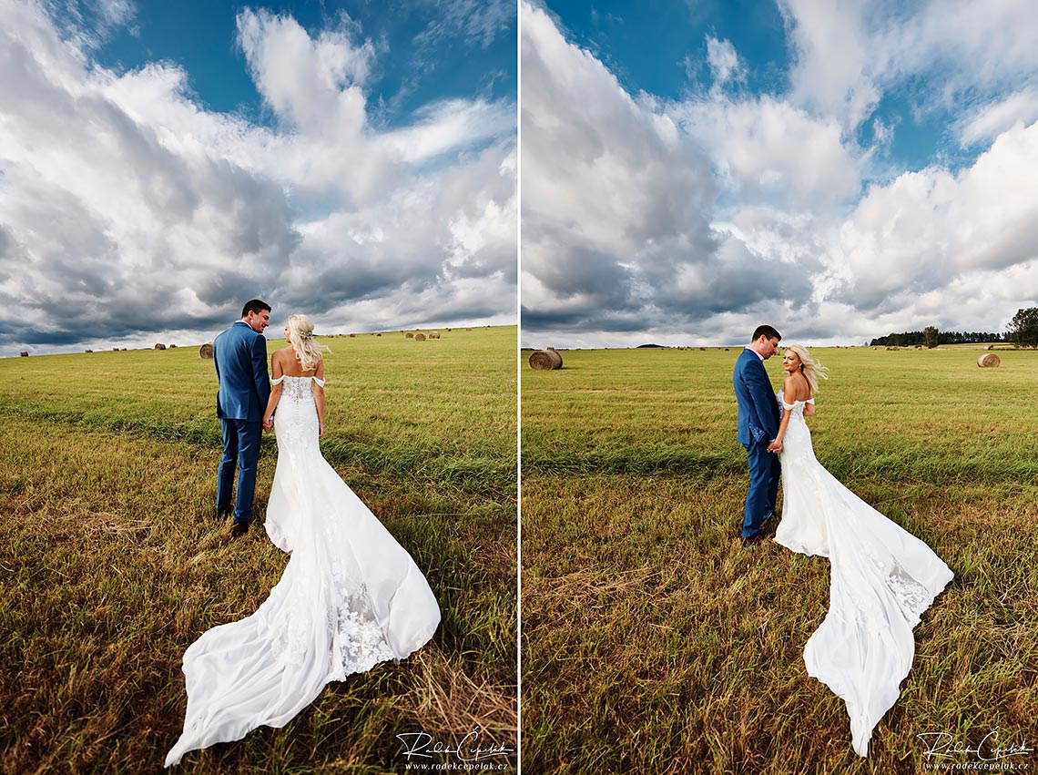 Bride and groom with dramatic clouds on wedding photo