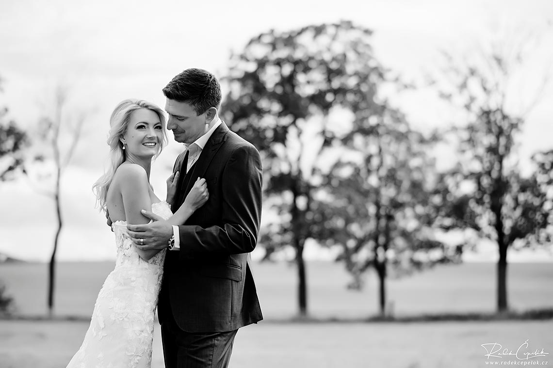 Blond hair bride on black and white wedding photograph
