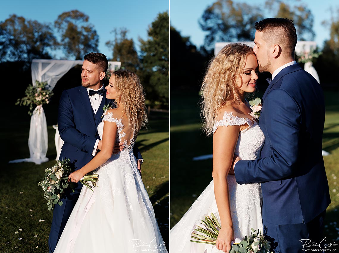 groom holdin bride in hands