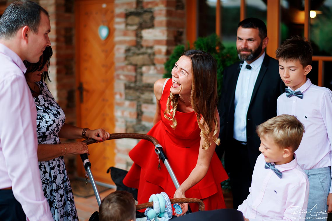 guests at wedding with small baby