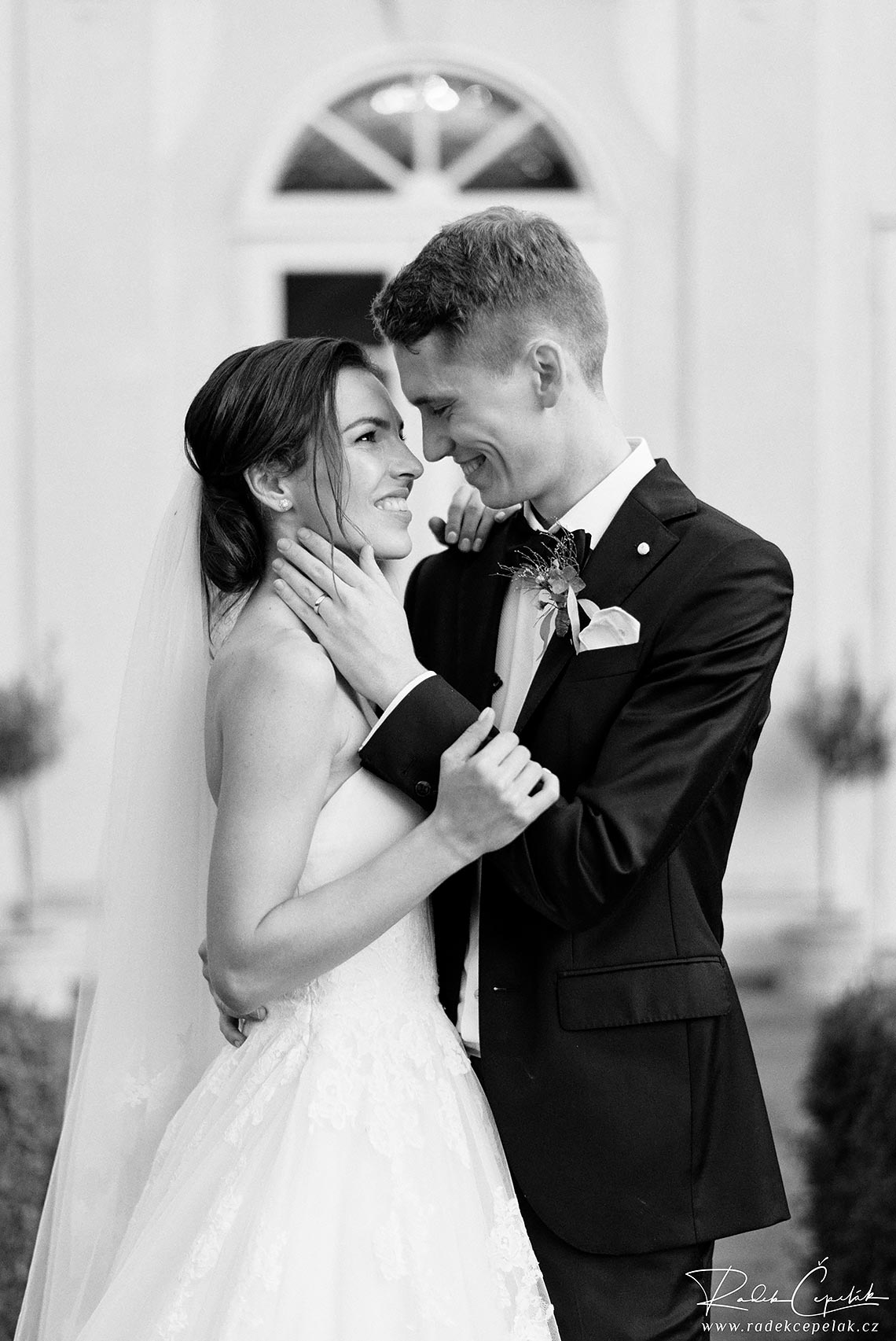 black and white wedding photography of bride and groom