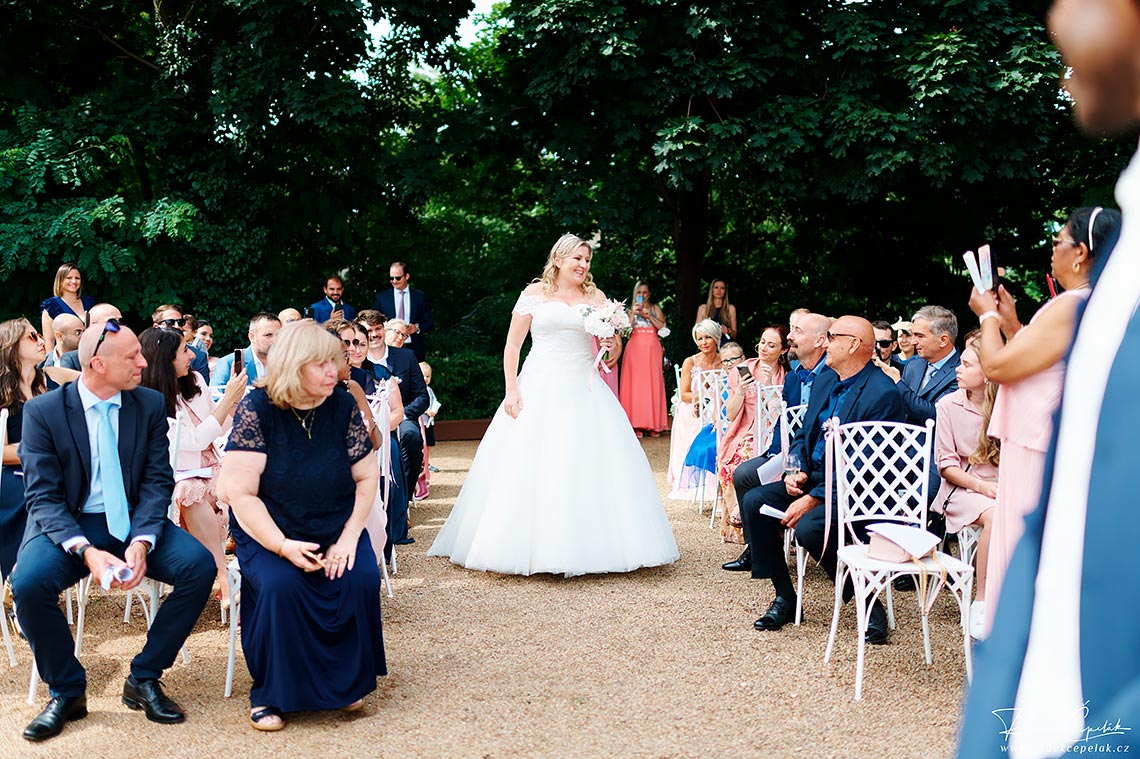 Bride walking the aisle alone