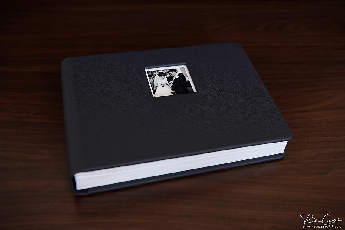 dark blue leather wedding album with photo in cover