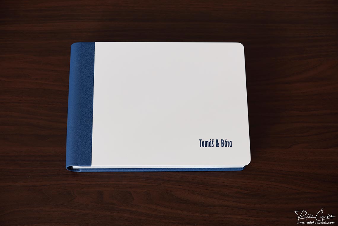 blue leather wedding album with white metail paint