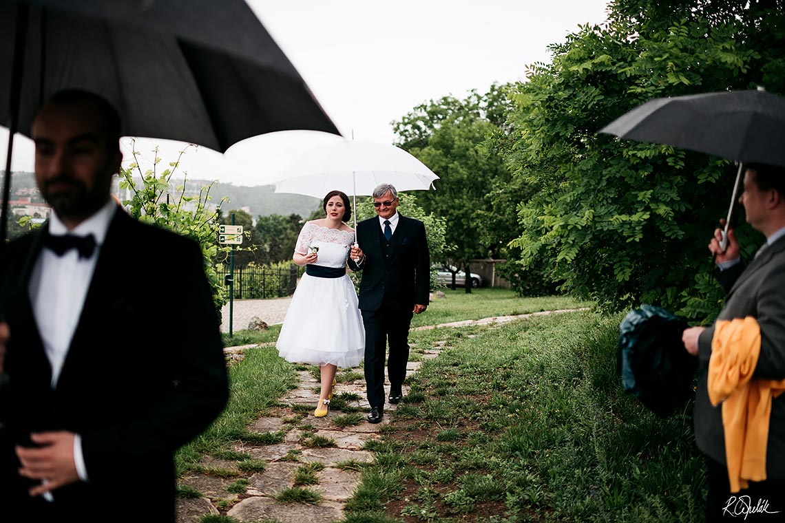 bride with her father going to ceremony