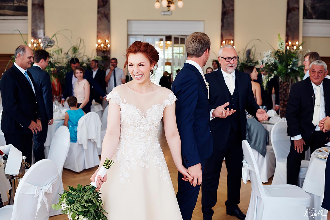 surprised bride and groom at wedding reception