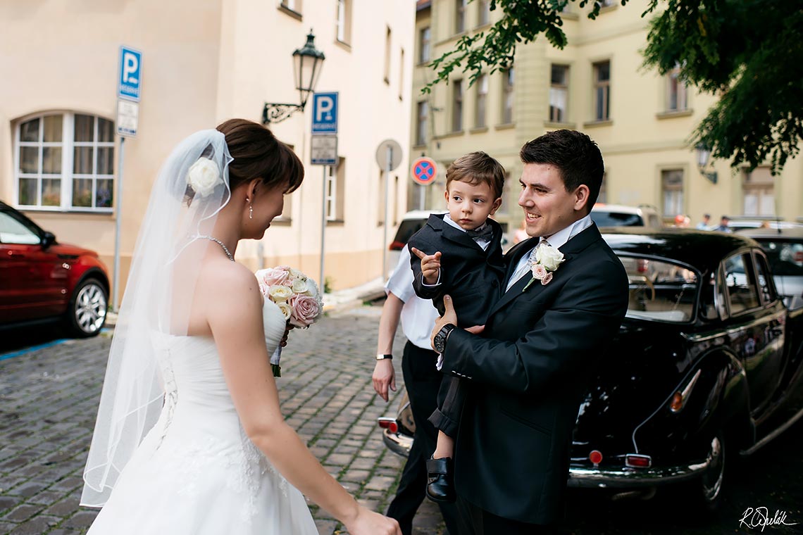 bride with father leaving for ceremony