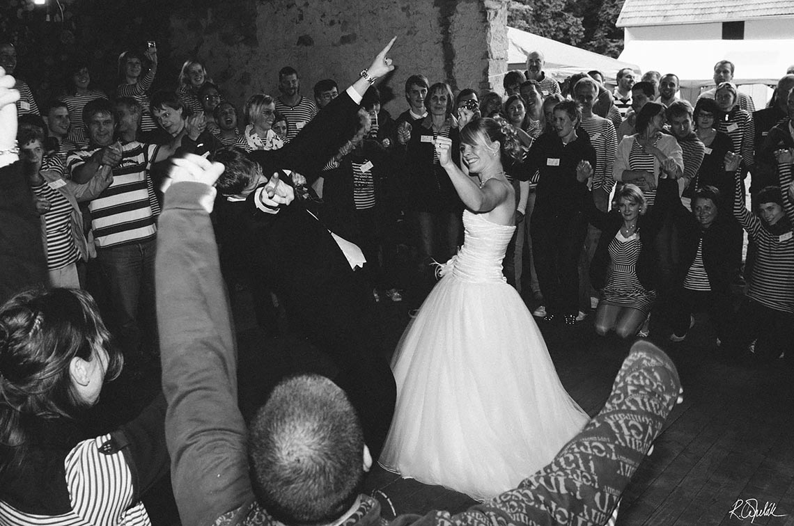 bride and groom first dance in the barn