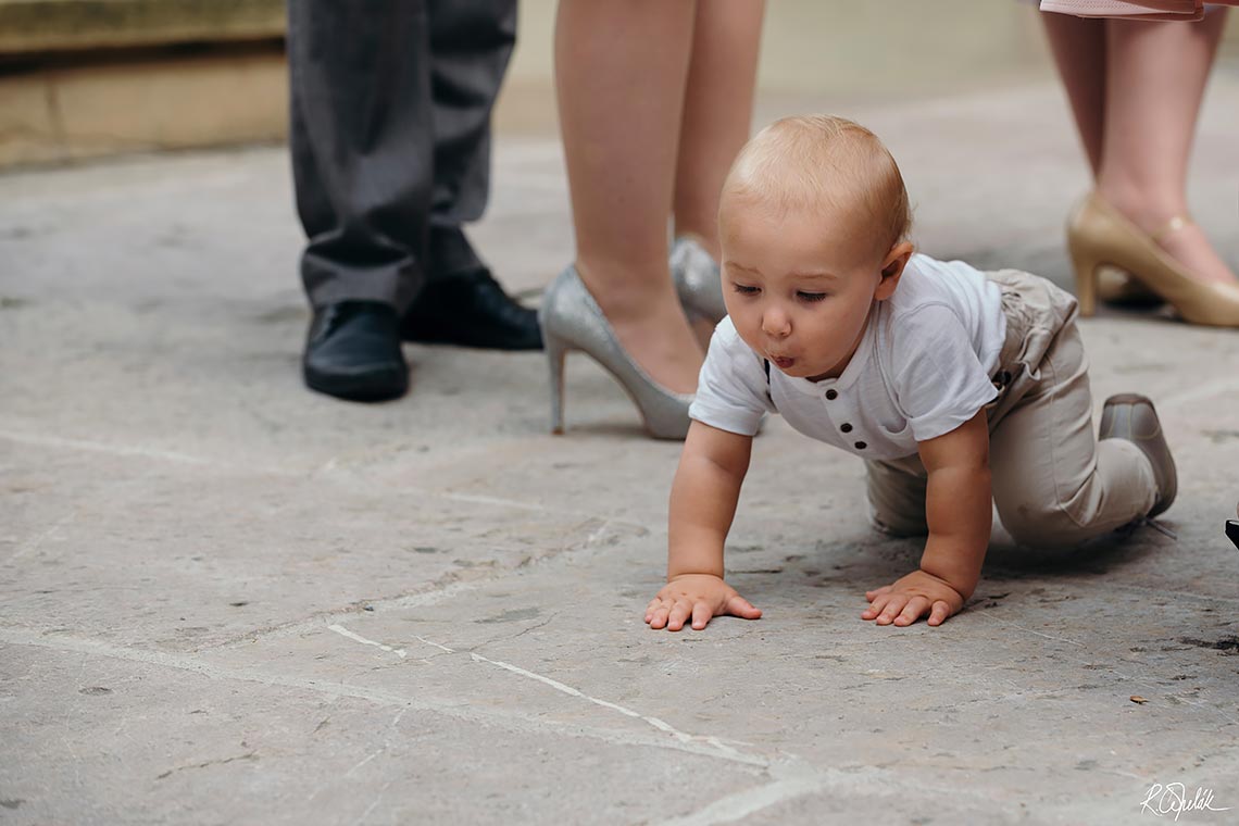 funny snapshot of baby at wedding