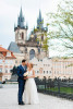 Bride and groom wedding photography in Prague at Old town square