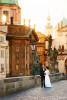 Bride and groom wedding photo on Charles bridge in Prague