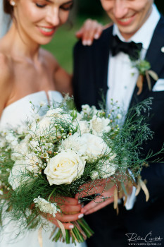 bride and groom with bouquet wedding photo