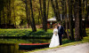 wedding photography bride and groom by a pond