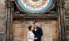 Wedding photo in front of Astronomical clock in Prague