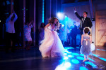 bride and groom dancing at wedding party