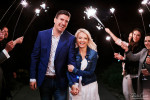 late night wedding photo of bride and groom with sparkles