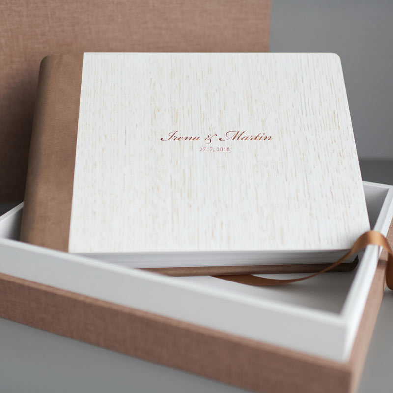 wedding album made of white wood and brown leather